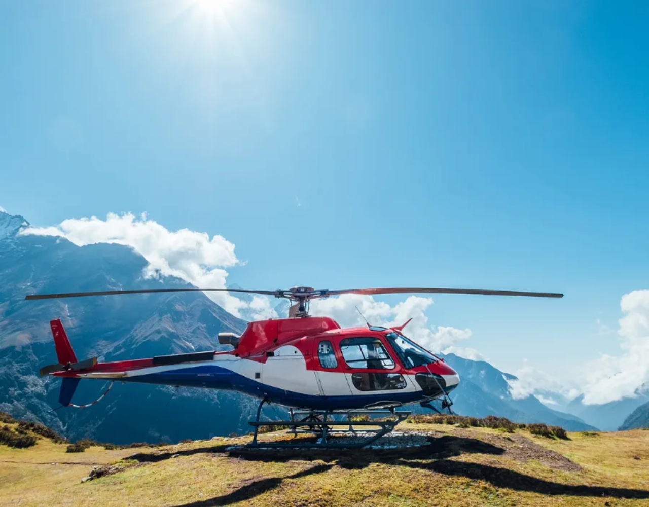 Shared Everest helicopter tour with passengers preparing to board at Kathmandu airport